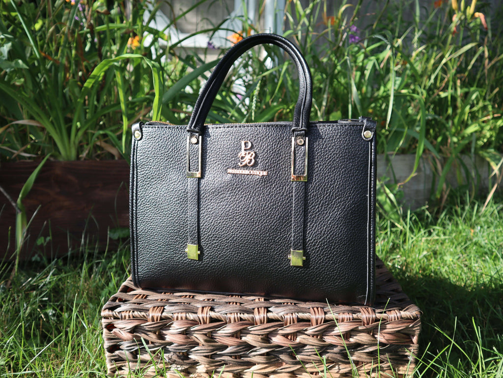 Black crossbody tote bag large hand bag from prestige boutique in black and gold. Stylish, everyday, business casual attire for women